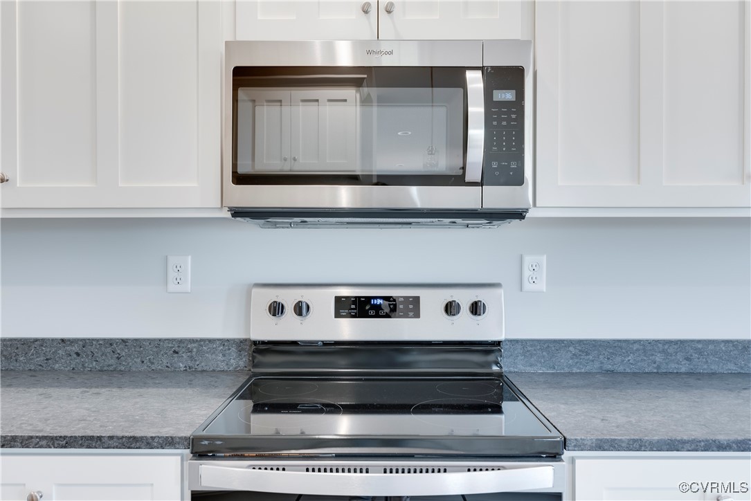 36 Highpockets Road Cartersville, VA 23027 - Photo 11 of 38 a stove top oven sitting inside of a kitchen