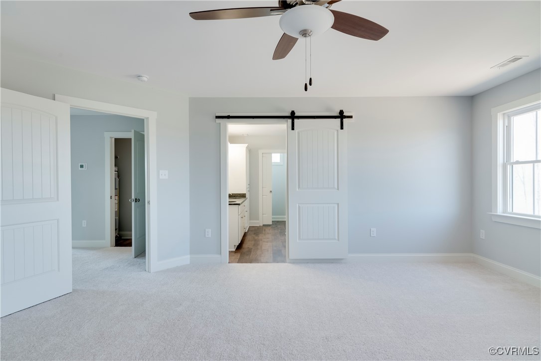 36 Highpockets Road Cartersville, VA 23027 - Photo 29 of 38 an empty room with a empty space and a ceiling fan