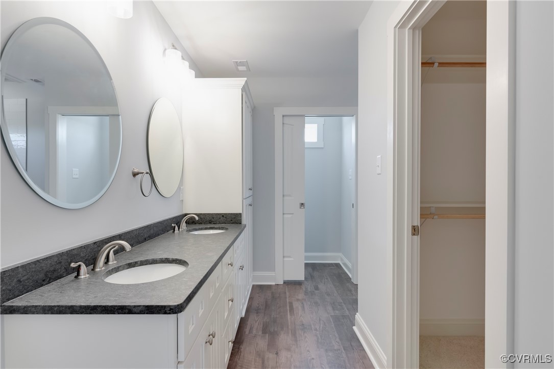 36 Highpockets Road Cartersville, VA 23027 - Photo 31 of 38 a bathroom with a granite countertop double vanity sink and a mirror