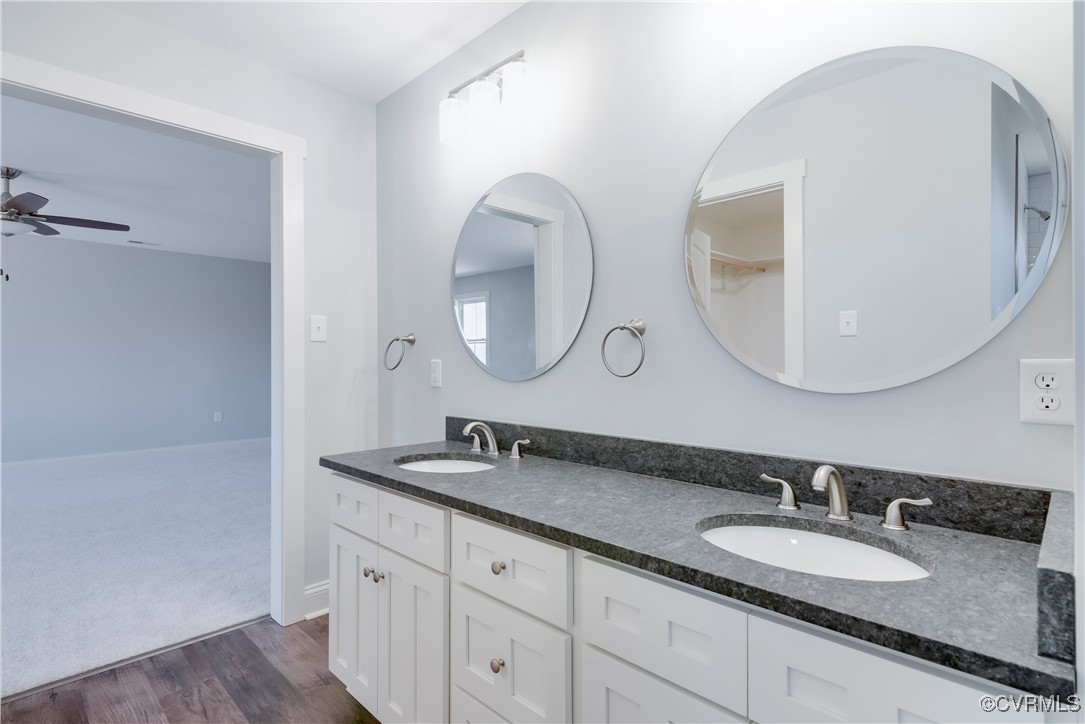 36 Highpockets Road Cartersville, VA 23027 - Photo 35 of 38 a bathroom with a granite countertop double vanity sinks and a mirror