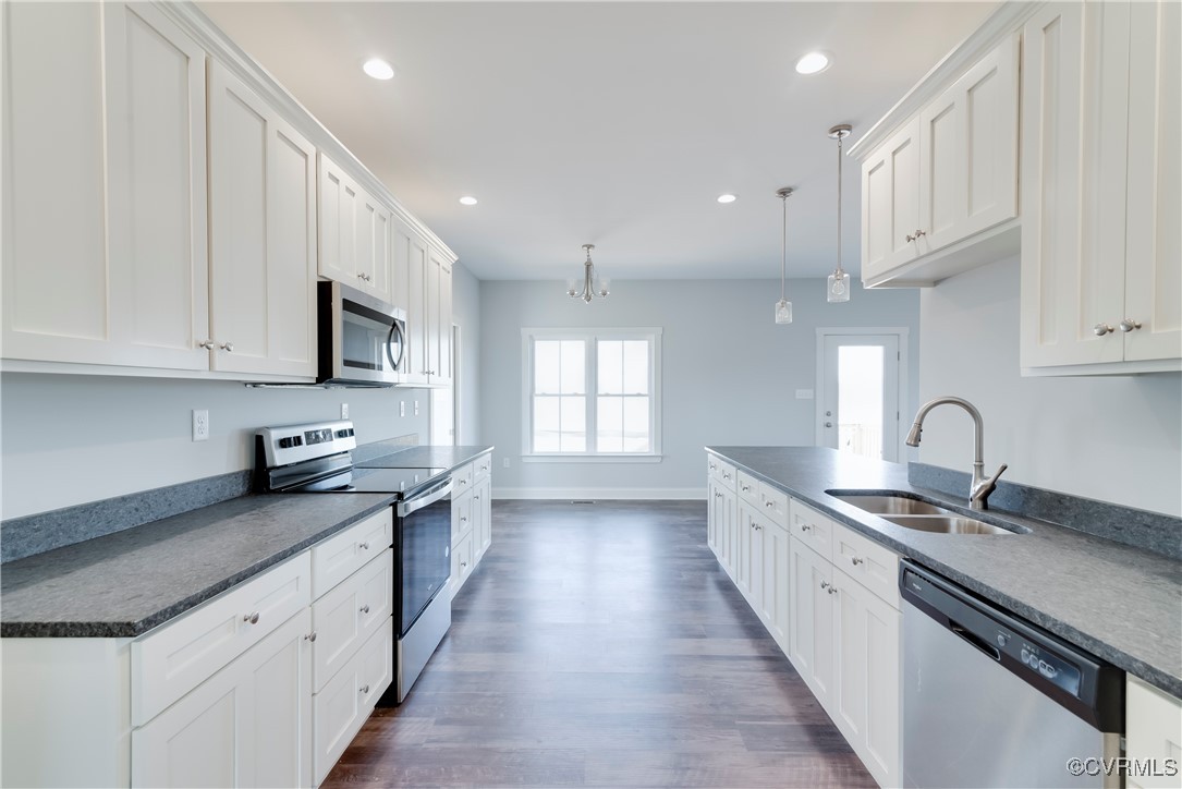 36 Highpockets Road Cartersville, VA 23027 - Photo 7 of 38 a large kitchen with stainless steel appliances granite countertop a sink a stove and a granite counter tops