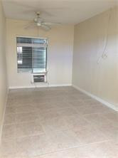 3313 Southeast 3rd Street Pompano Beach, FL 33062 - Photo 20 of 22 a view of empty room with window