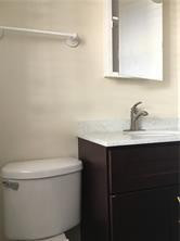 3313 Southeast 3rd Street Pompano Beach, FL 33062 - Photo 22 of 22 a bathroom with a sink and a toilet