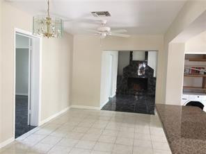 3313 Southeast 3rd Street Pompano Beach, FL 33062 - Photo 5 of 22 a living room with furniture and a chandelier