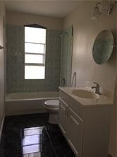 3313 Southeast 3rd Street Pompano Beach, FL 33062 - Photo 9 of 22 a bathroom with a sink and a mirror