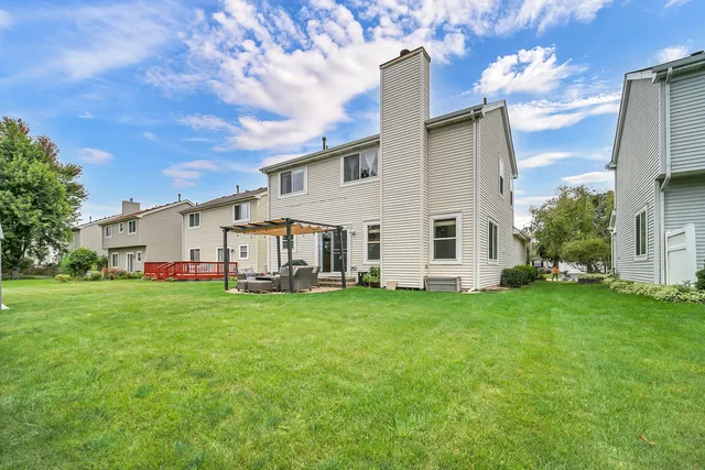 a front view of house with yard