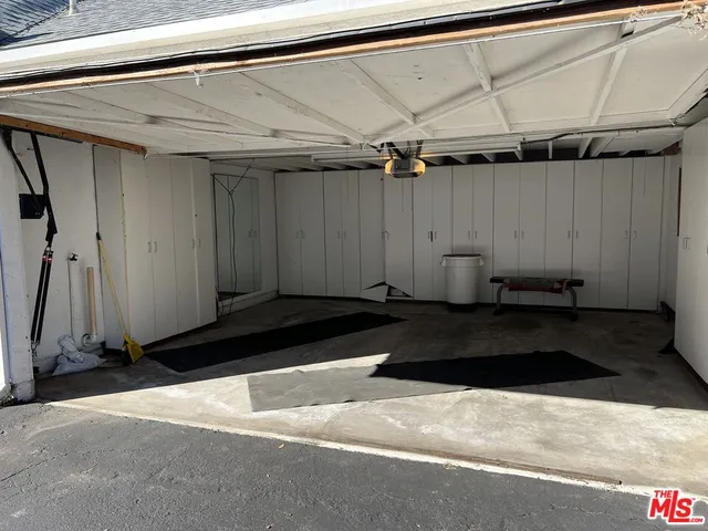 a view of a lake with couches and city view