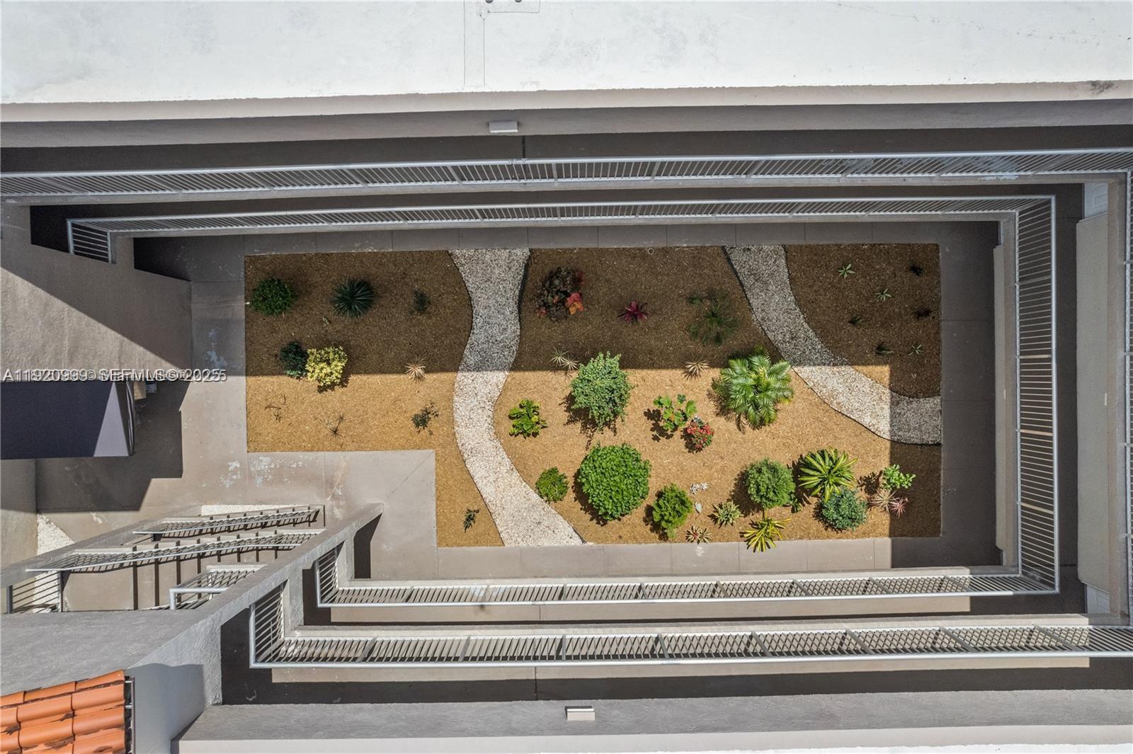 6135 Northwest 186th Street, Unit 202 Hialeah, FL 33015 - Photo 19 of 21 workspace with a fireplace