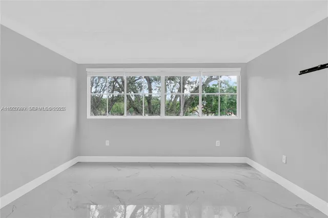 an empty room with a window