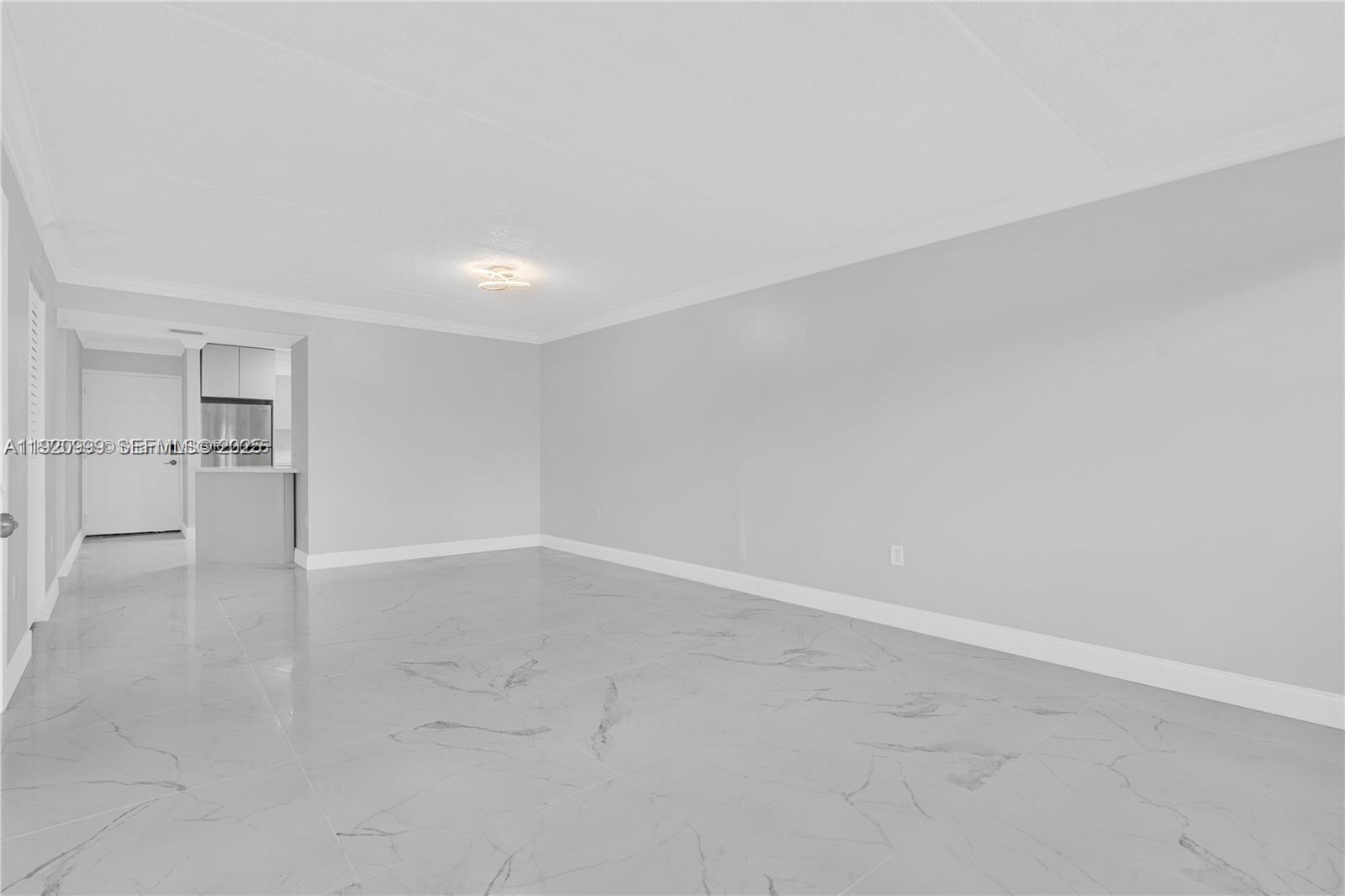 6135 Northwest 186th Street, Unit 202 Hialeah, FL 33015 - Photo 6 of 21 a view of empty room