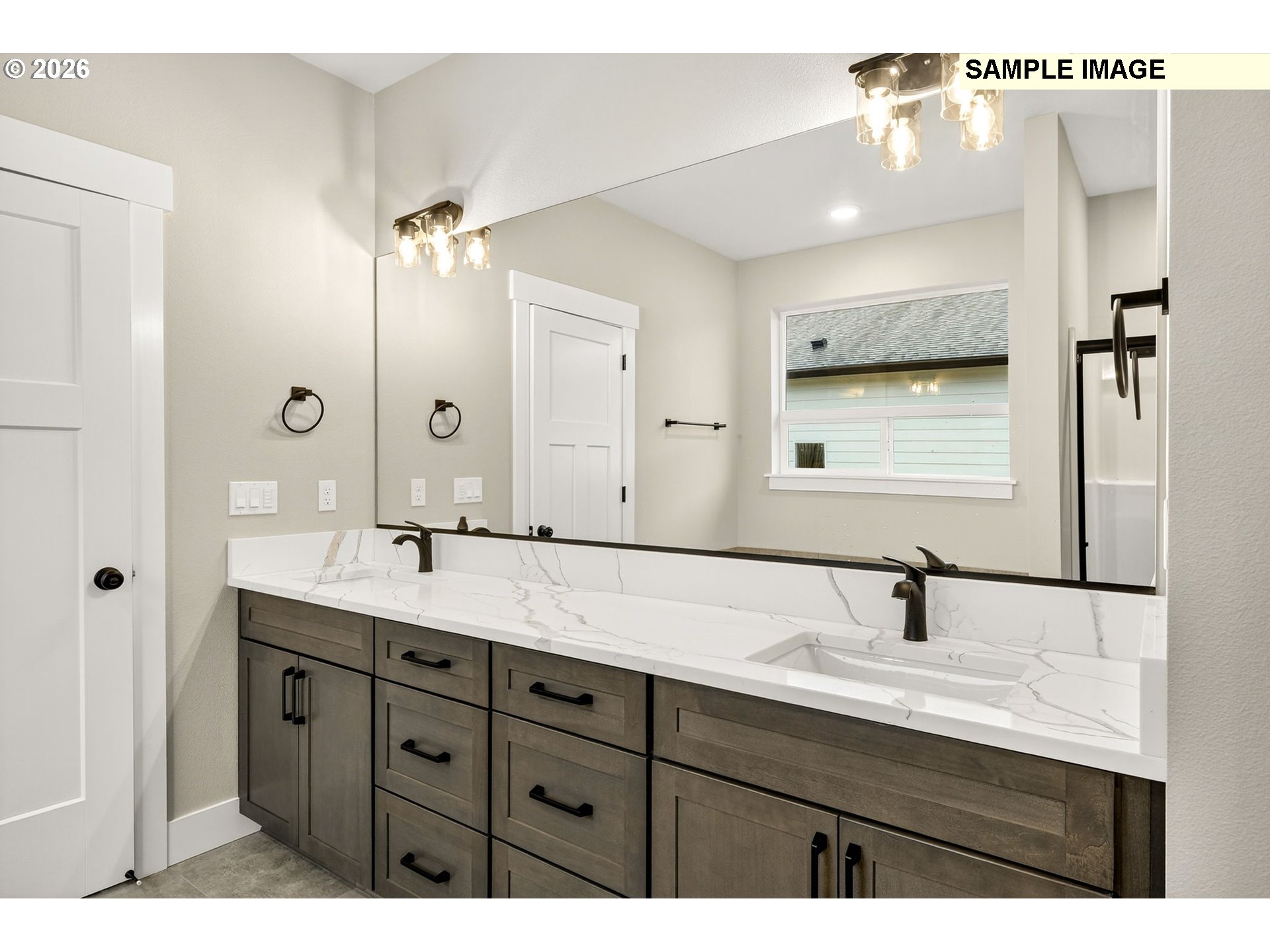 3352 Northeast Sweetwater Road, Unit 80 Estacada, OR 97023 - Photo 27 of 48 a bathroom with a double vanity sink and mirror