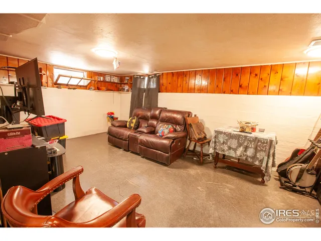 a terrace of a house with outdoor seating