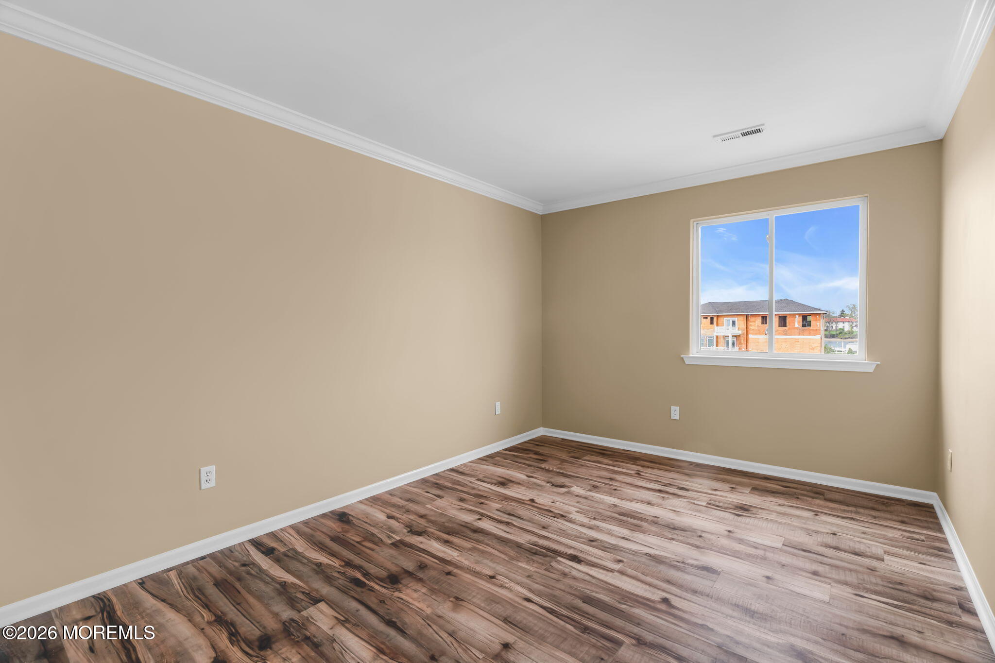 120 South Concourse, Unit 310 Neptune Township, NJ 07753 - Photo 19 of 44 a view of empty room with wooden floor