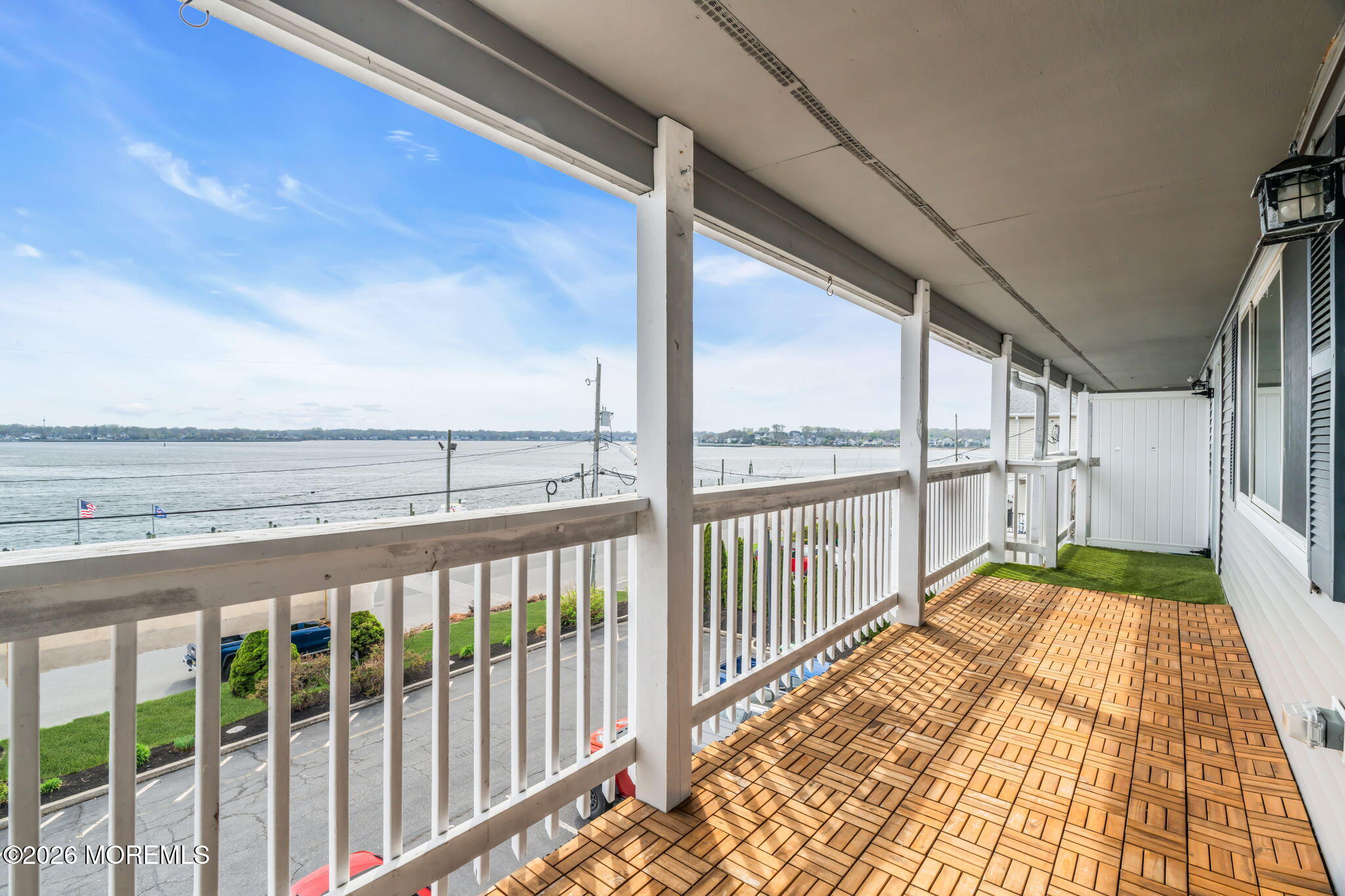 120 South Concourse, Unit 310 Neptune Township, NJ 07753 - Photo 23 of 44 a view of a balcony with wooden floor
