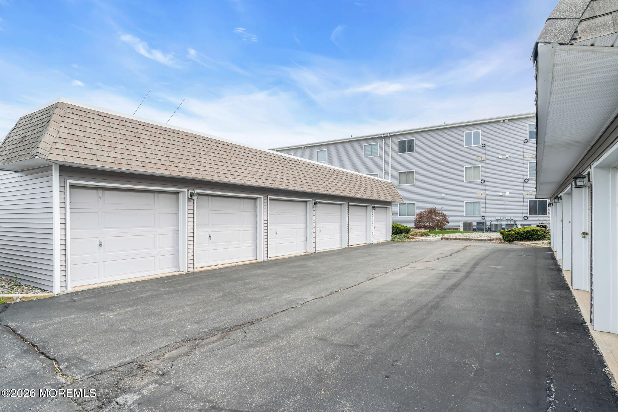 120 South Concourse, Unit 310 Neptune Township, NJ 07753 - Photo 27 of 44 a view of a house with a garage