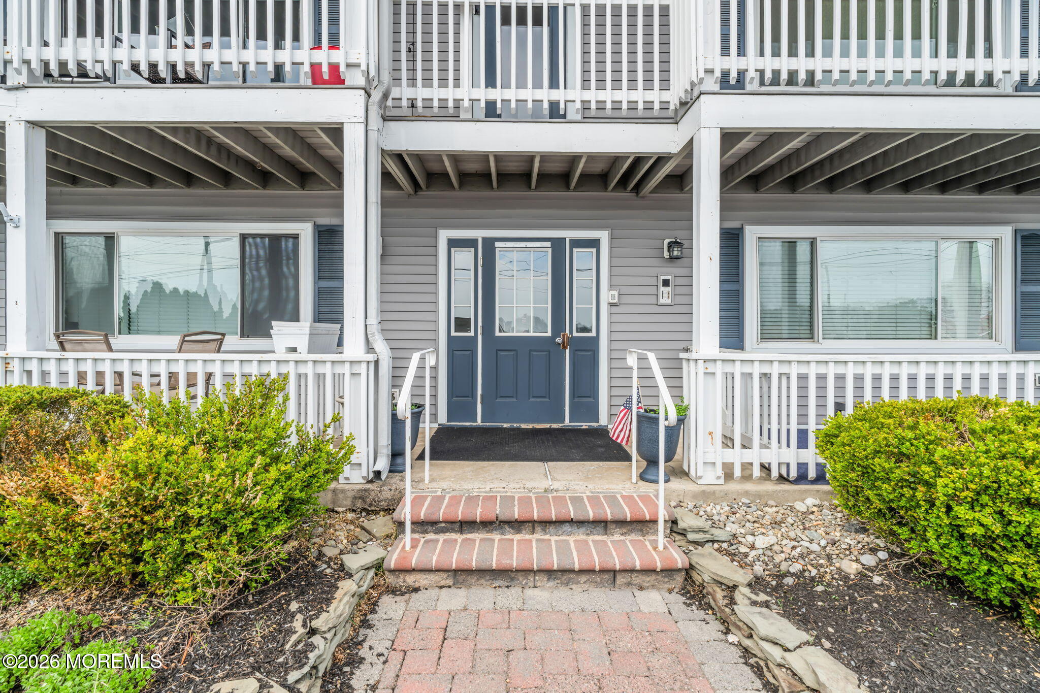 120 South Concourse, Unit 310 Neptune Township, NJ 07753 - Photo 3 of 44 a front view of a house with a garden