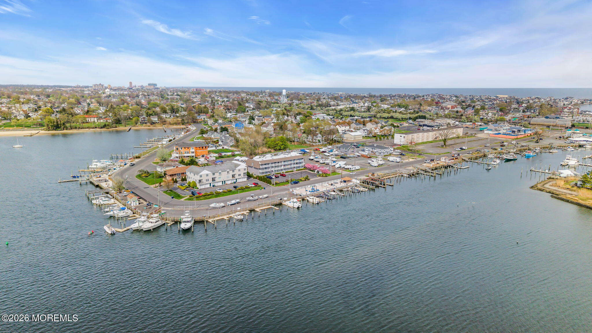 120 South Concourse, Unit 310 Neptune Township, NJ 07753 - Photo 40 of 44 an aerial view of a house with a ocean view