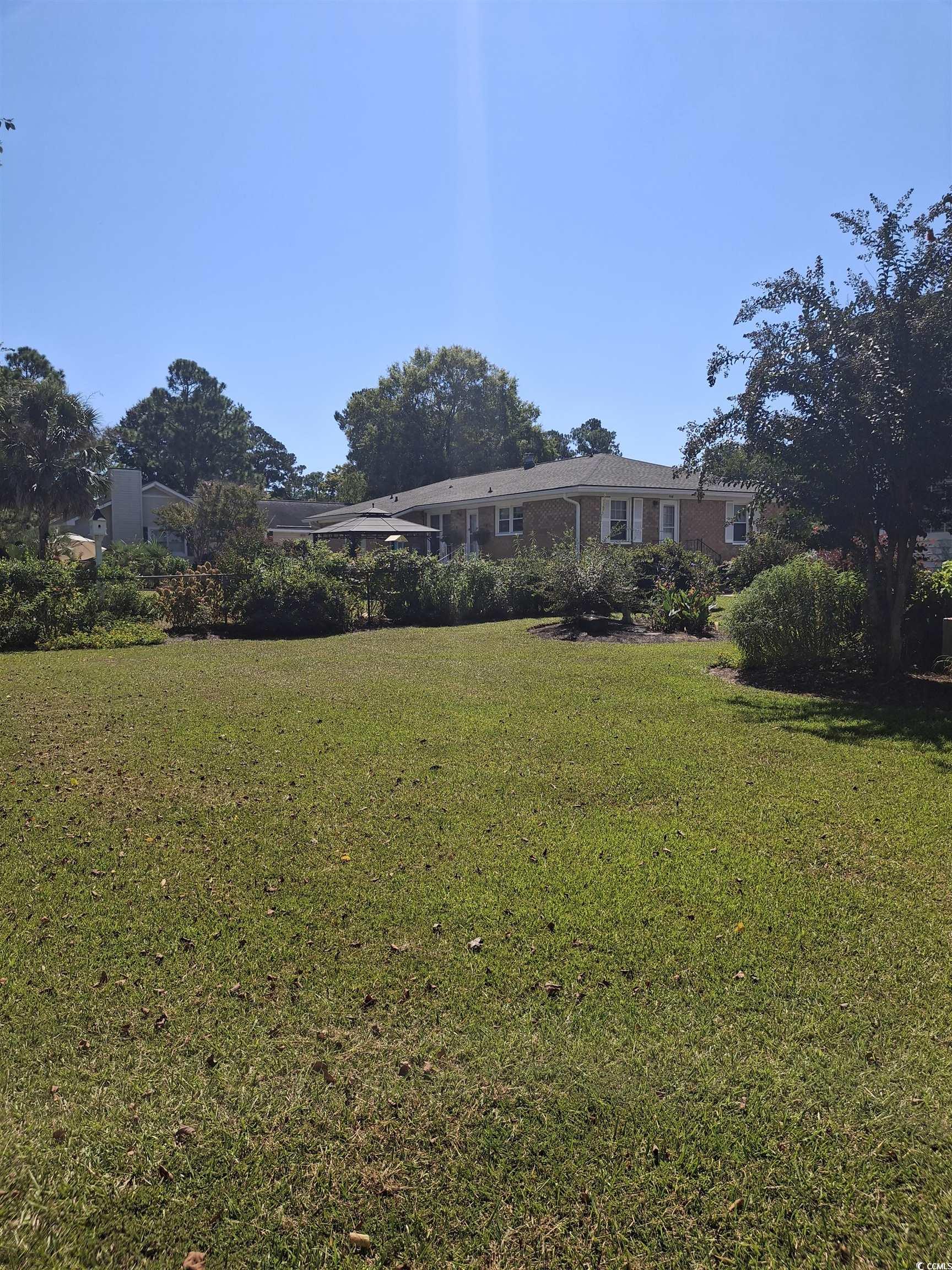 410 Devon Road Marion, SC 29571 - Photo 11 of 38 View of green lawn