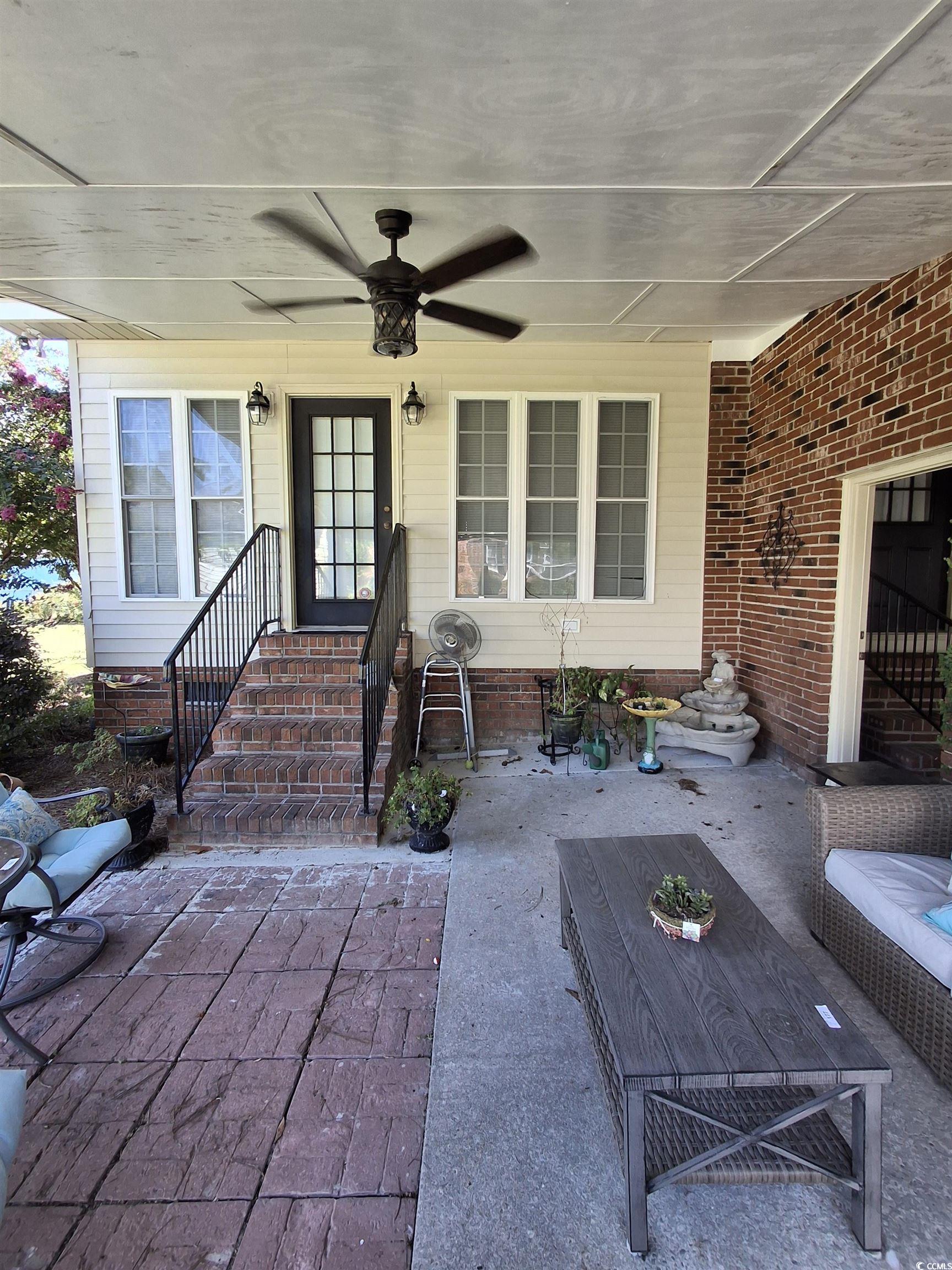 410 Devon Road Marion, SC 29571 - Photo 16 of 38 Doorway to property with ceiling fan and a patio