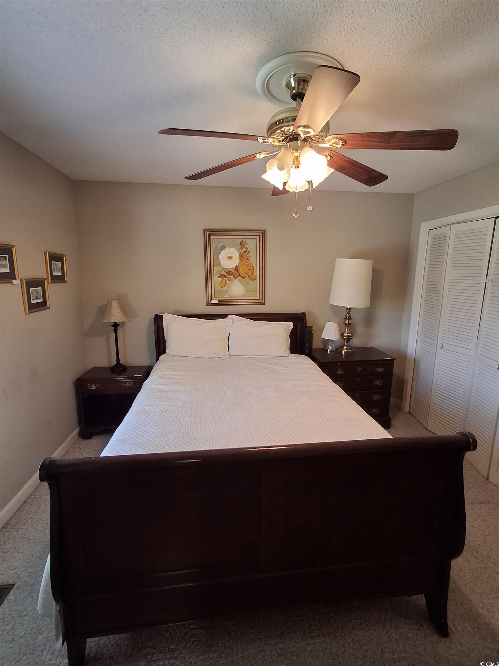 410 Devon Road Marion, SC 29571 - Photo 22 of 38 Bedroom featuring carpet floors, a ceiling fan, a