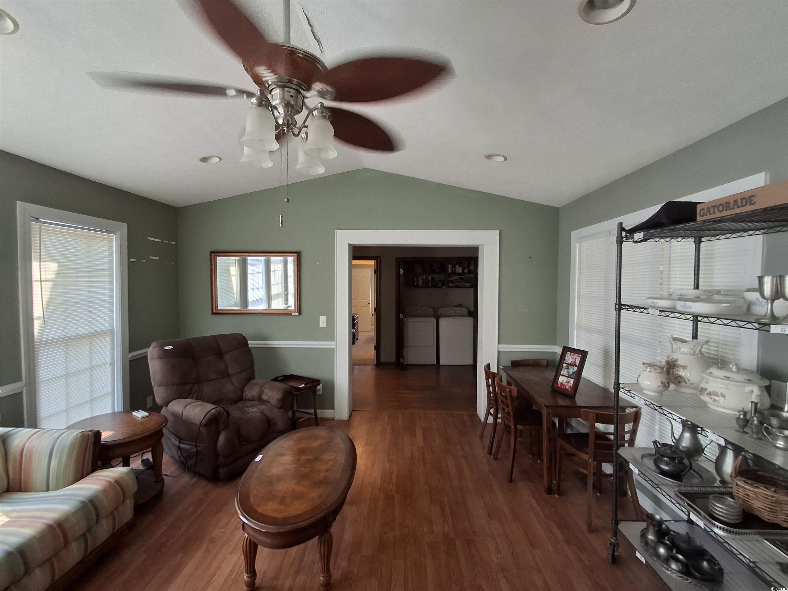 410 Devon Road Marion, SC 29571 - Photo 36 of 38 Living room featuring vaulted ceiling, washing mac