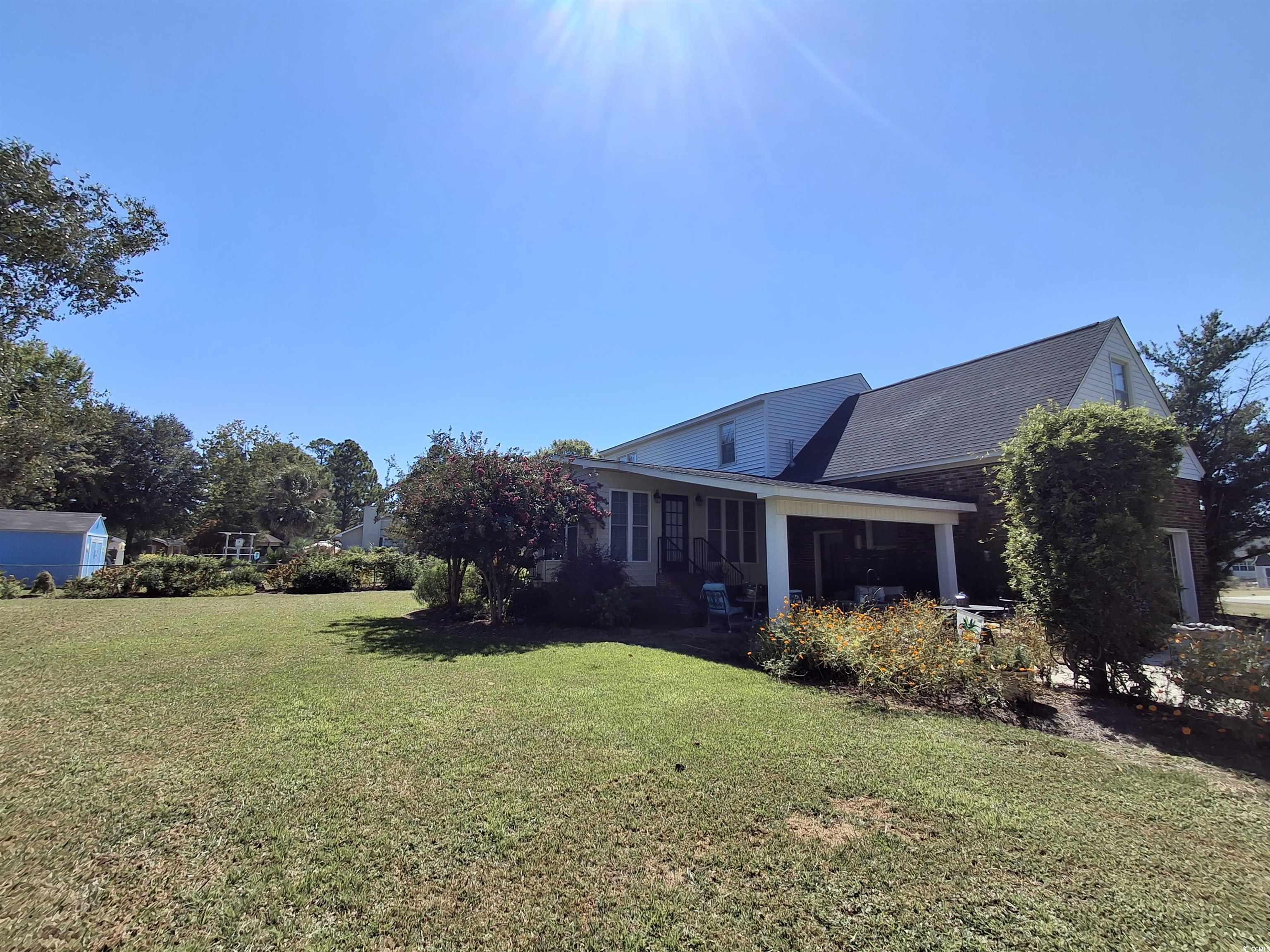 410 Devon Road Marion, SC 29571 - Photo 9 of 38 View of green lawn