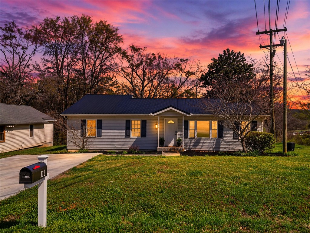 112 Newry Road Seneca, SC 29672 - Photo 1 of 19 This charming home offers comfortable living with a well-maintained exterior and inviting curb appeal.