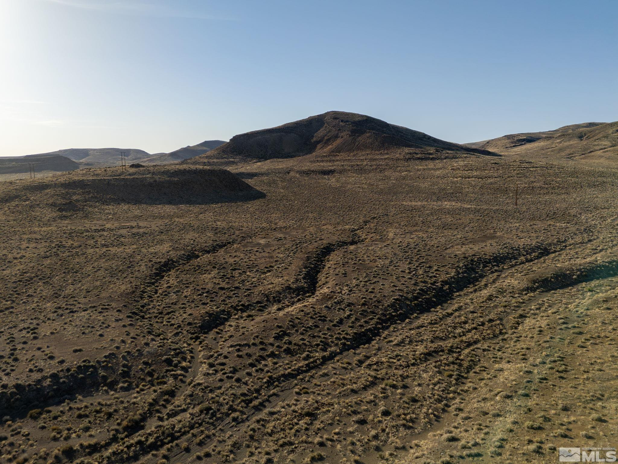 509113 Trinity Fallon, NV 89406 - Photo 24 of 24 a view of a large mountain in front of a house