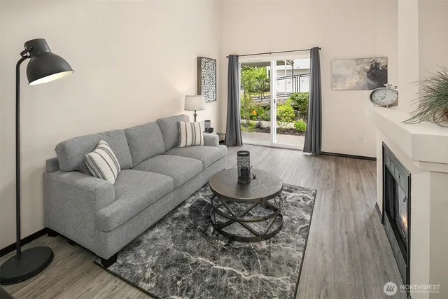 a view of a workspace with a window and shelf