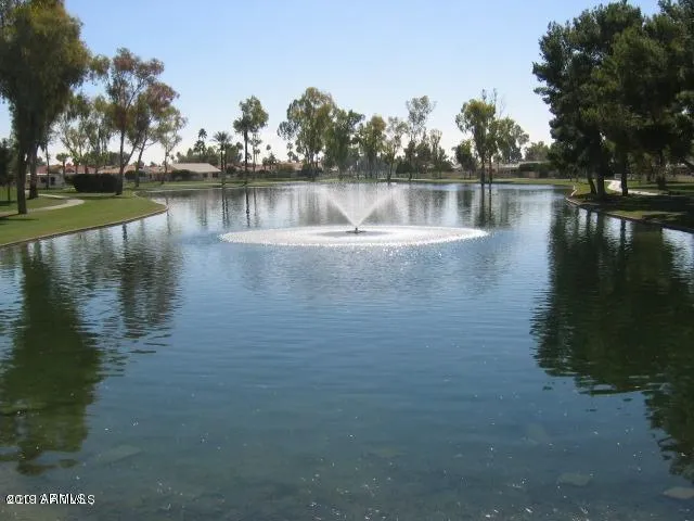 a view of a lake with houses with lake view