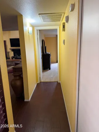 a bathroom with a double vanity sink and mirror