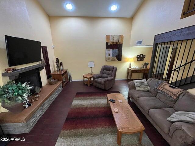 9635 East Palomino Place Sun Lakes, AZ 85248 - Photo 6 of 26 a living room with furniture and a flat screen tv