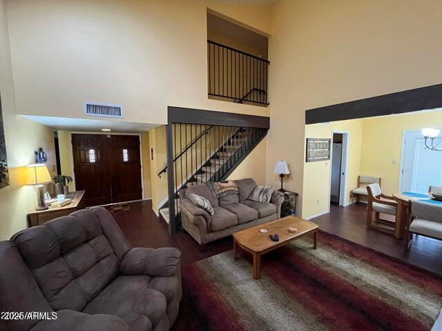 9635 East Palomino Place Sun Lakes, AZ 85248 - Photo 7 of 26 a living room with furniture and wooden floor