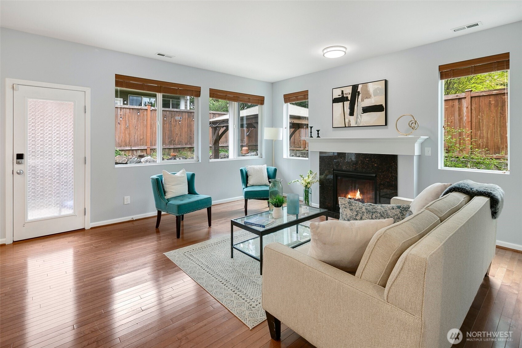3931 177th Street Southeast Bothell, WA 98012 - Photo 17 of 39 a living room with furniture and a fireplace