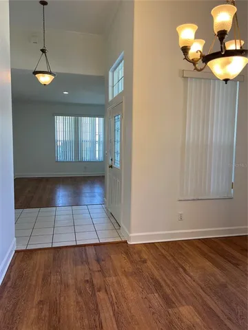 a view of a kitchen from the hallway