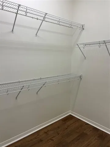 a kitchen with a stove top oven and sink