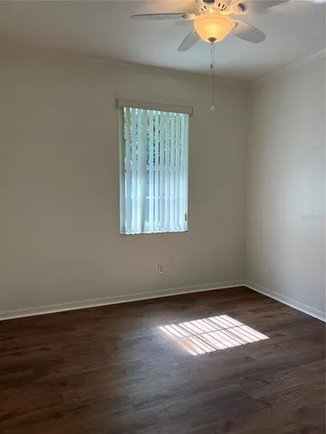 a kitchen with stainless steel appliances a stove and a microwave