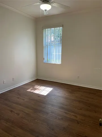 a bathroom with a sink toilet and mirror