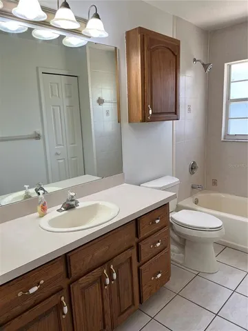 a view of a room with a large window