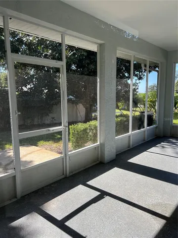a living room with a large window