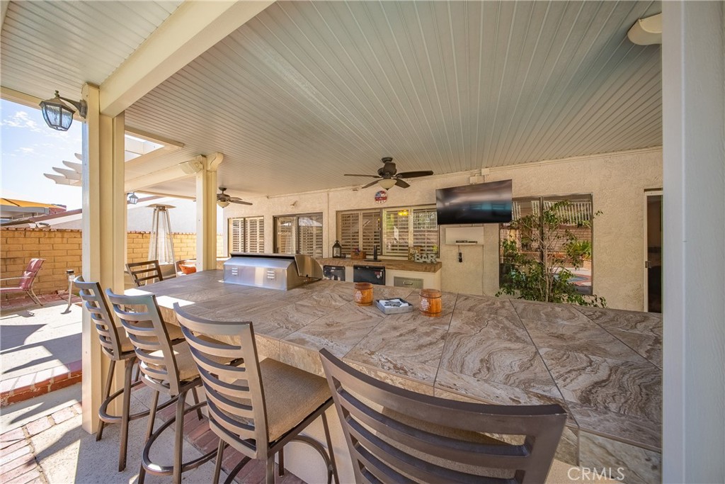 21902-21902 Raintree Lane Lake Forest, CA 92630 - Photo 30 of 46 a living room with furniture and a table