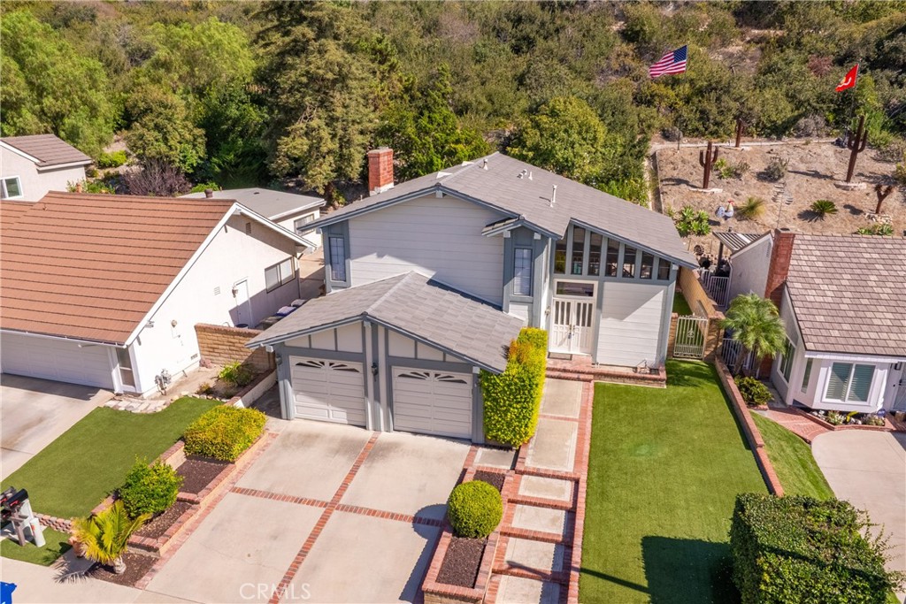 21902-21902 Raintree Lane Lake Forest, CA 92630 - Photo 39 of 46 an aerial view of a house with a yard