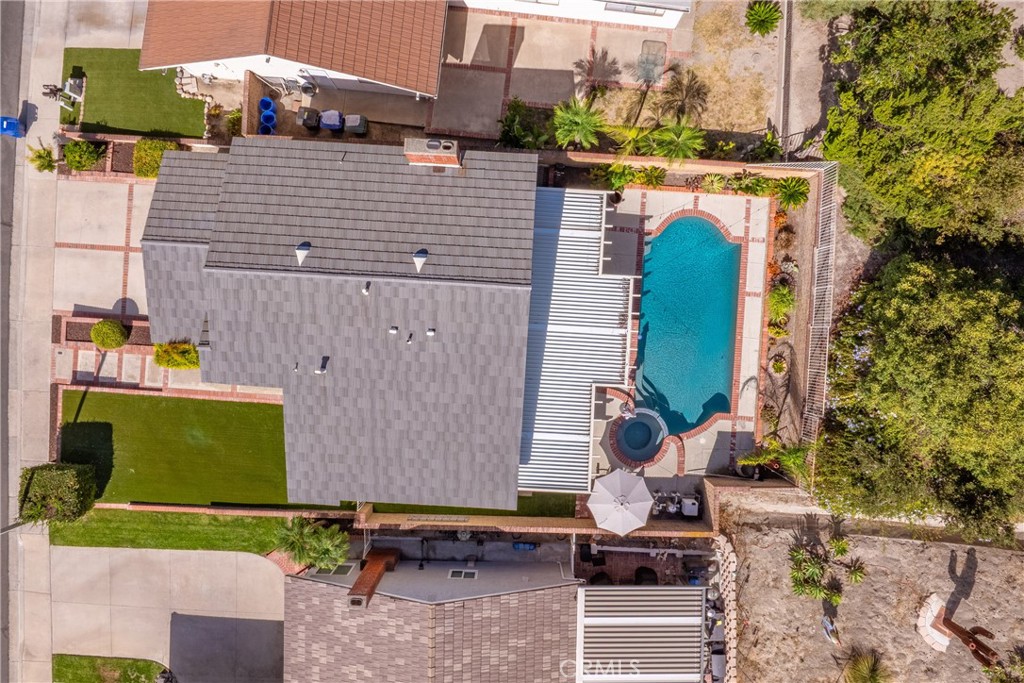 21902-21902 Raintree Lane Lake Forest, CA 92630 - Photo 44 of 46 an aerial view of a tennis ground with large trees