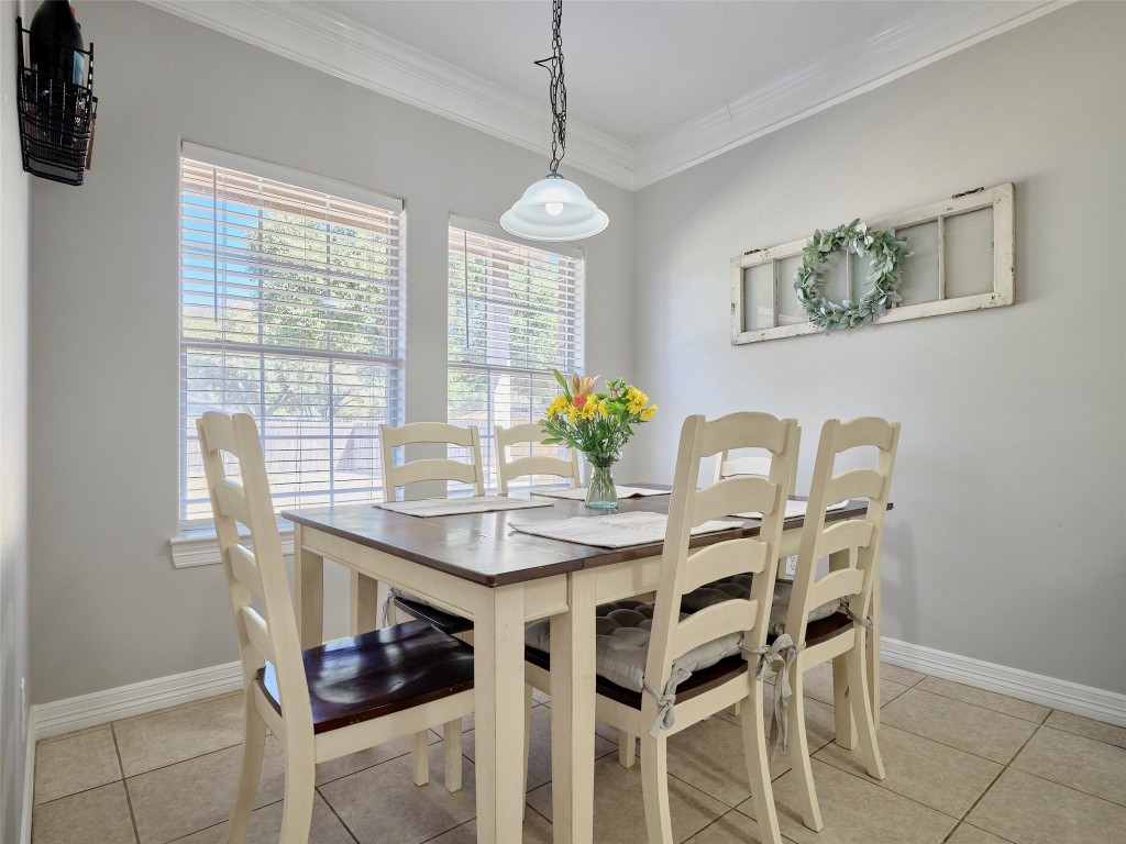 9315 Anna Street Needville, TX 77461 - Photo 17 of 46 a view of a dining room with furniture window and outside view