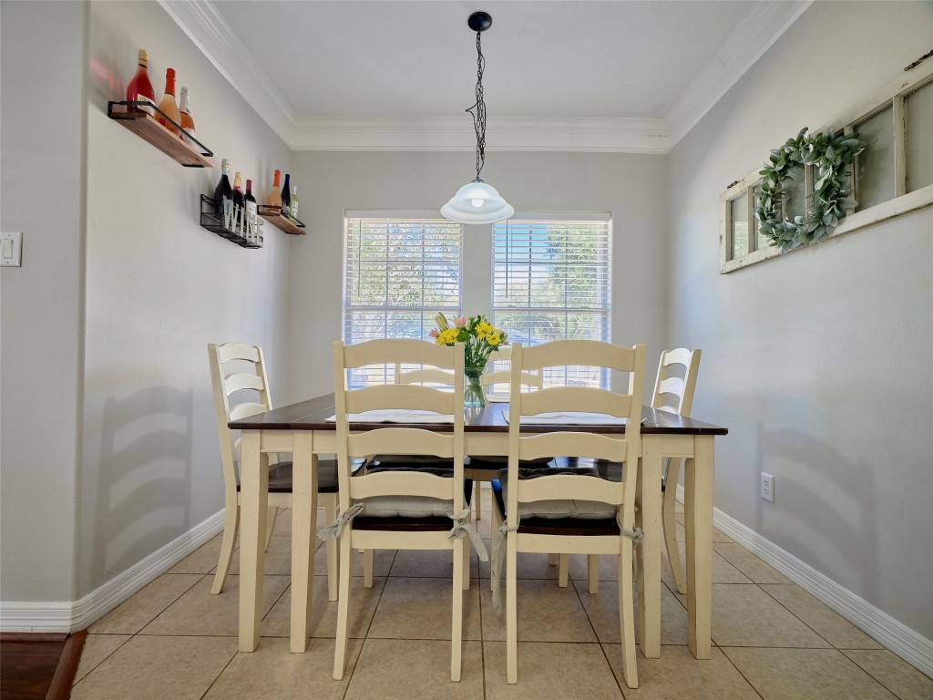 9315 Anna Street Needville, TX 77461 - Photo 18 of 46 a view of a dining room with furniture window and outside view