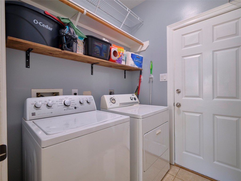 9315 Anna Street Needville, TX 77461 - Photo 40 of 46 a utility room with dryer and washer