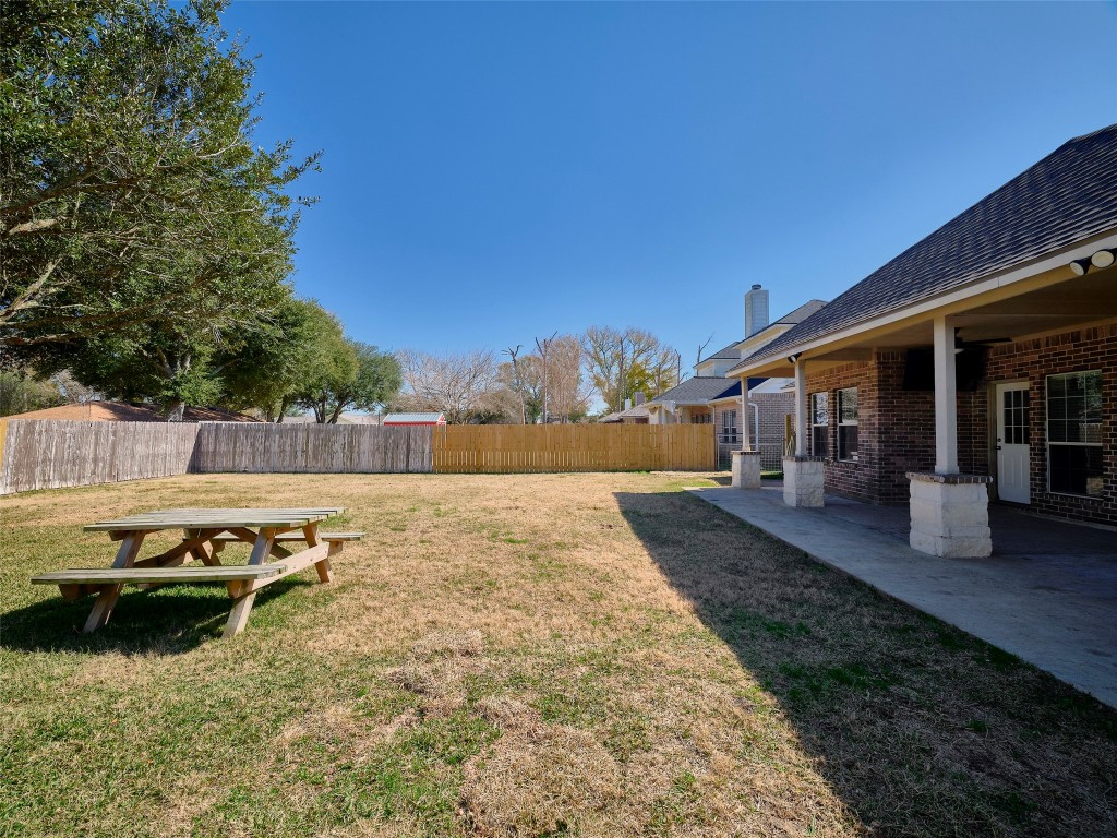 9315 Anna Street Needville, TX 77461 - Photo 42 of 46 a view of a backyard with sitting area