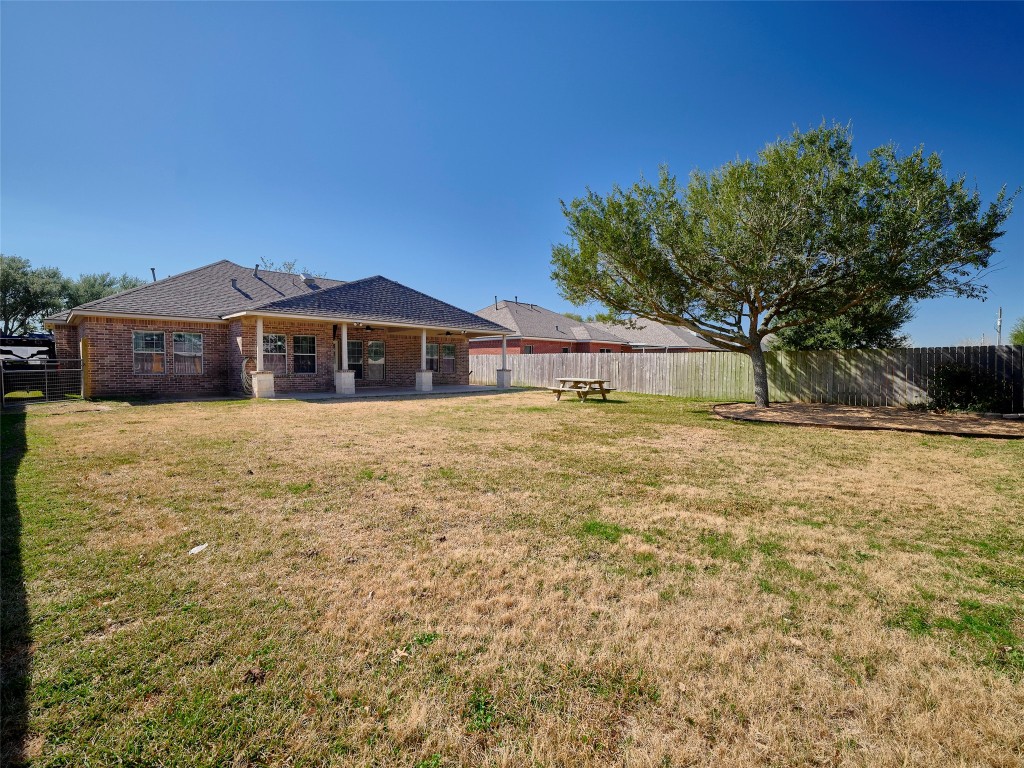 9315 Anna Street Needville, TX 77461 - Photo 43 of 46 a view of a house with a yard