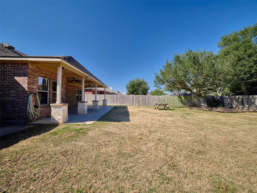 9315 Anna Street Needville, TX 77461 - Photo 44 of 46 a view of a house with backyard and trees