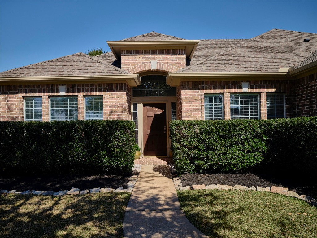 9315 Anna Street Needville, TX 77461 - Photo 7 of 46 a front view of a house with a yard